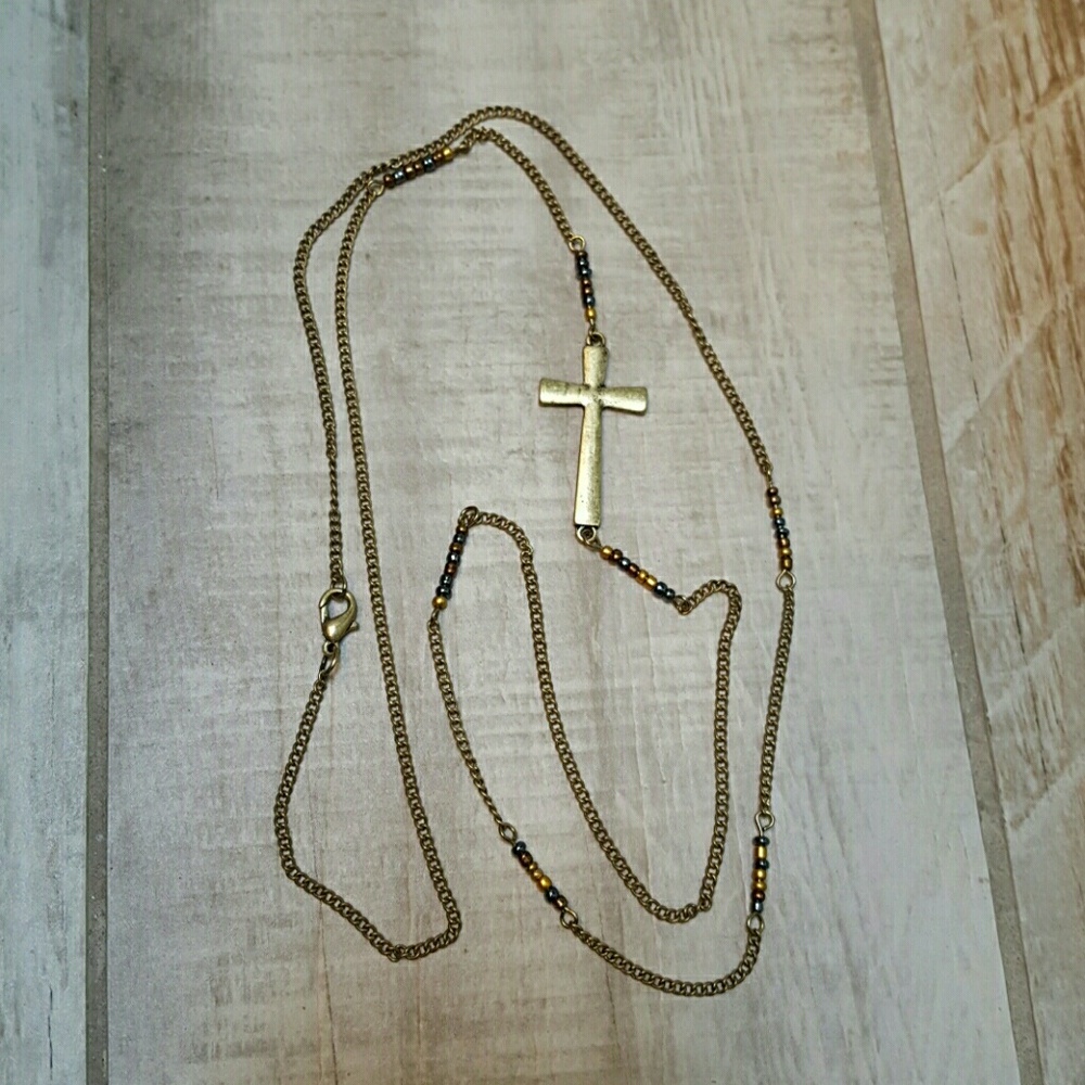 Asymmetrical cross necklace